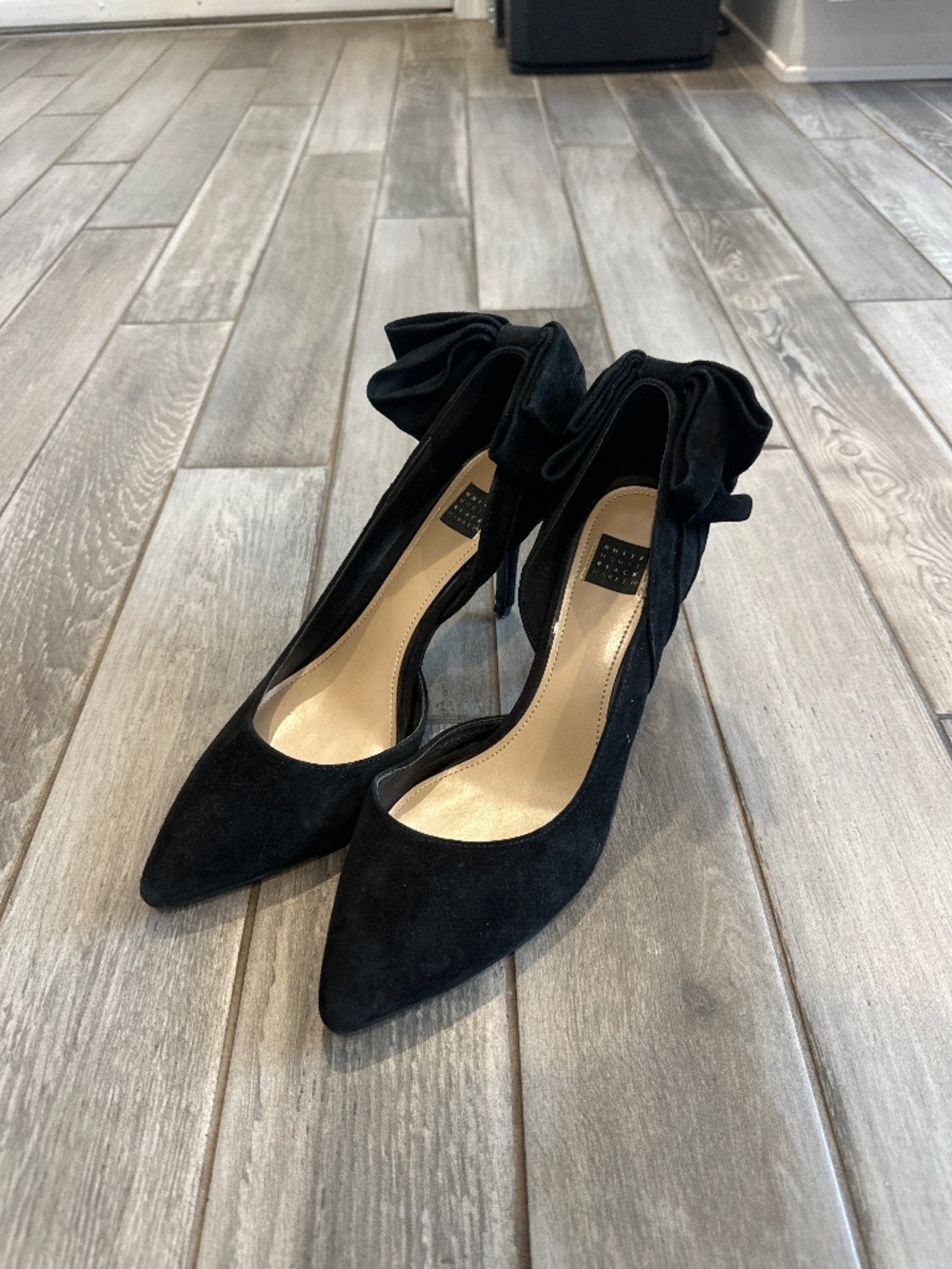 Black heels with bow